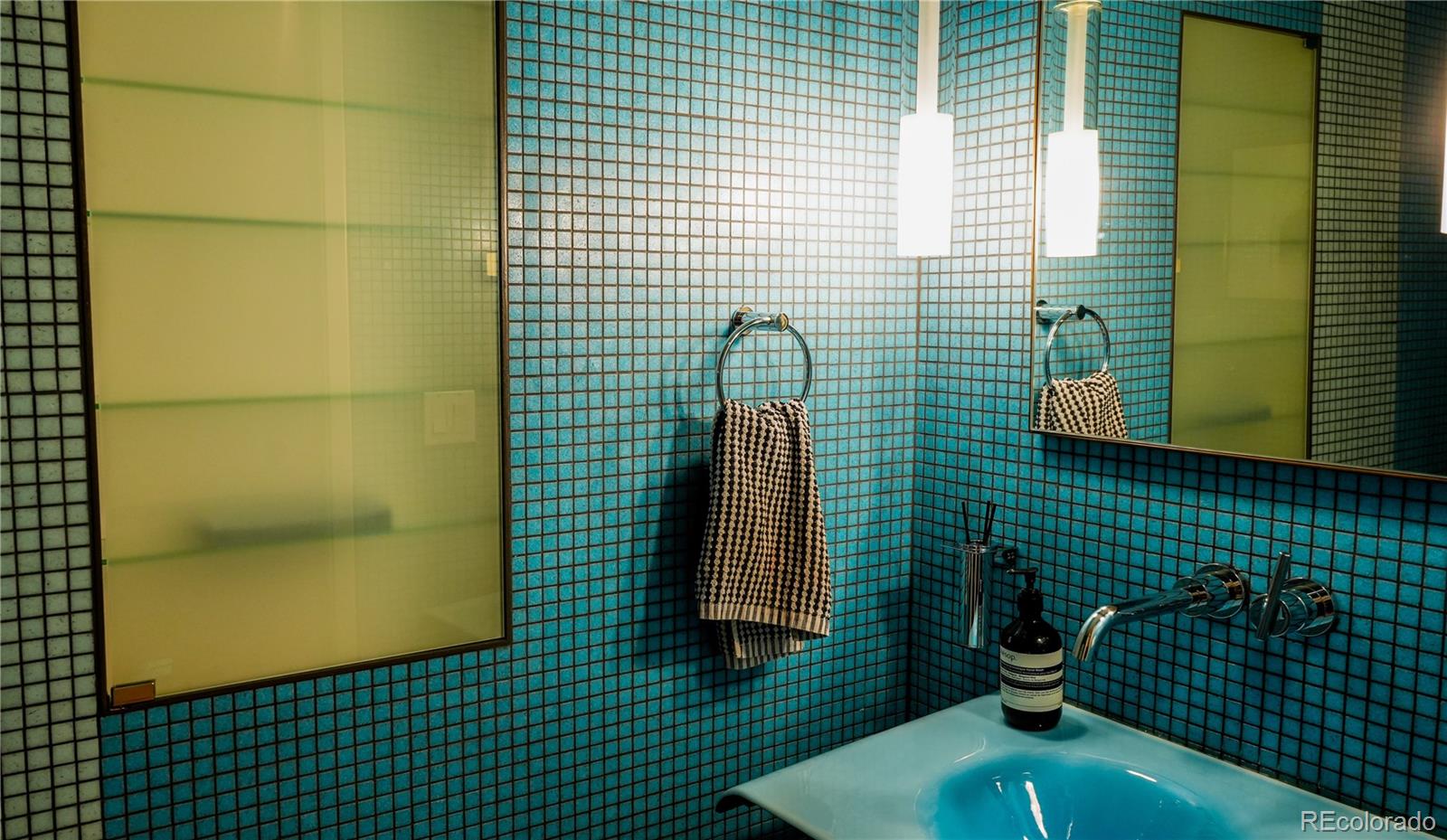 421 Dexter Street Denver, CO 80220 - Photo 10 of 36 a bathroom with a sink