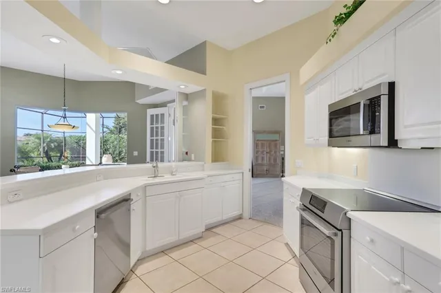 $990,000 | 4594 Snowy Egret Drive, Naples, FL 34119