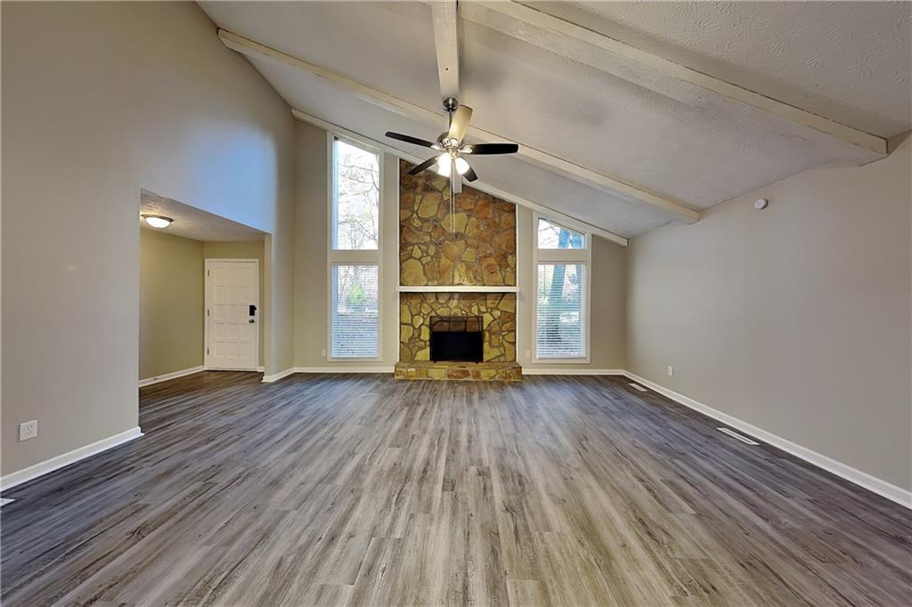 2021 Kramer Way Marietta, GA 30062 - Photo 2 of 21 wooden floor in an empty room with a window
