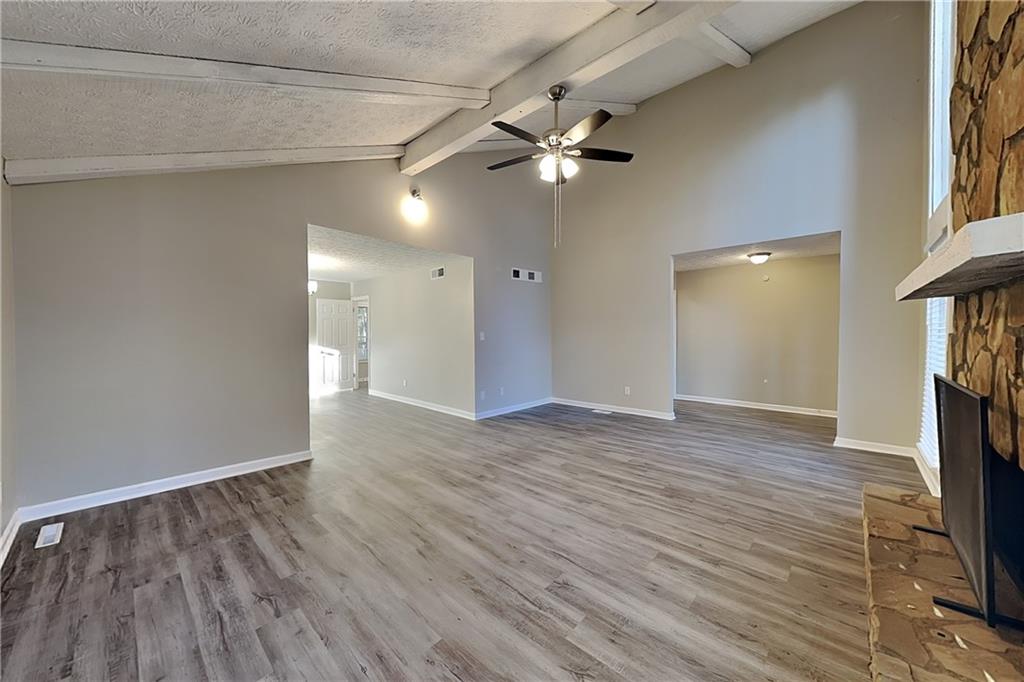 2021 Kramer Way Marietta, GA 30062 - Photo 3 of 21 a view of an empty room with wooden floor and a window