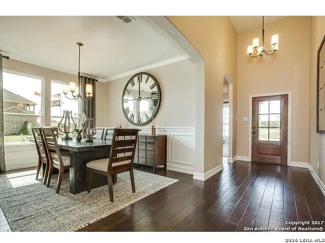 119 Aberdeen Boerne, TX 78015 - Photo 7 of 10 a view of a dining room with furniture window and wooden floor