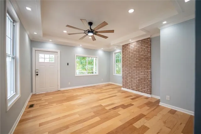 a view of an empty room with a window