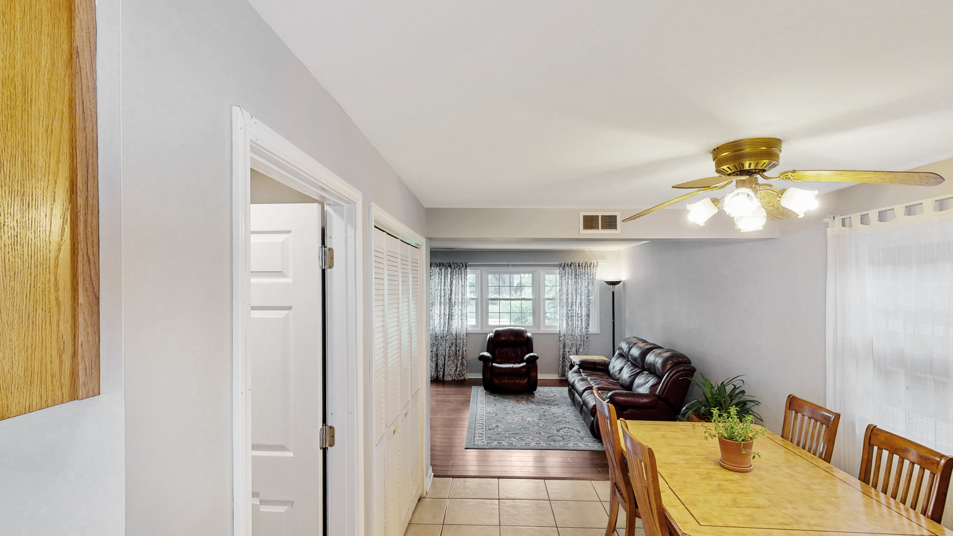 12 Hampton Road Montgomery, IL 60538 - Photo 8 of 28 a view of a livingroom with furniture and windows