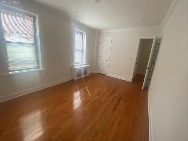 a bathroom with a toilet a sink and a shower