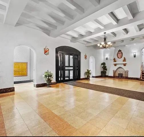 a view of a living room and kitchen