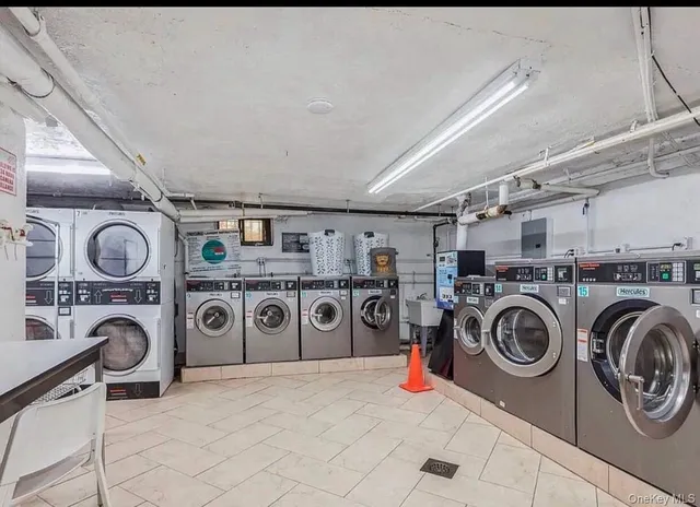a utility room with dryer and washer