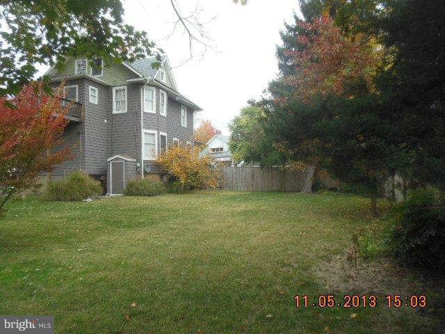 5232 Tramore Road Baltimore, MD 21214 - Photo 12 of 20 a view of a house with a yard