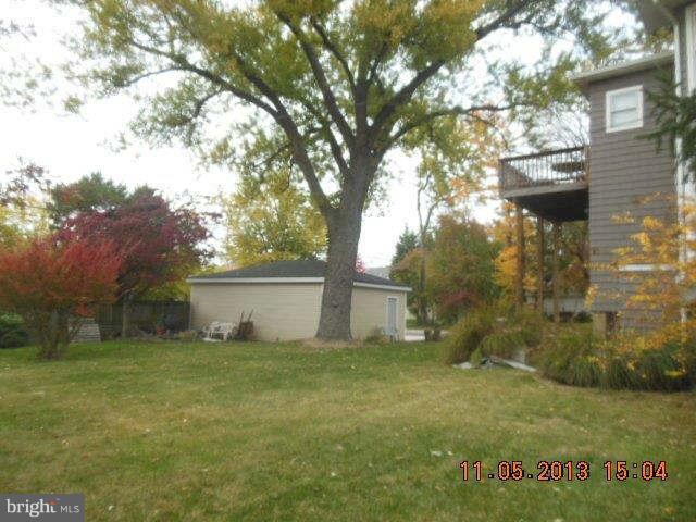 5232 Tramore Road Baltimore, MD 21214 - Photo 14 of 20 a view of a house with a yard