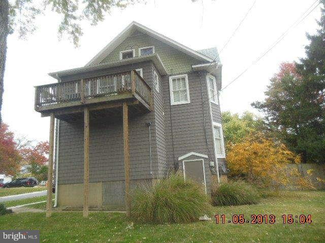 5232 Tramore Road Baltimore, MD 21214 - Photo 16 of 20 a front view of a house with garden