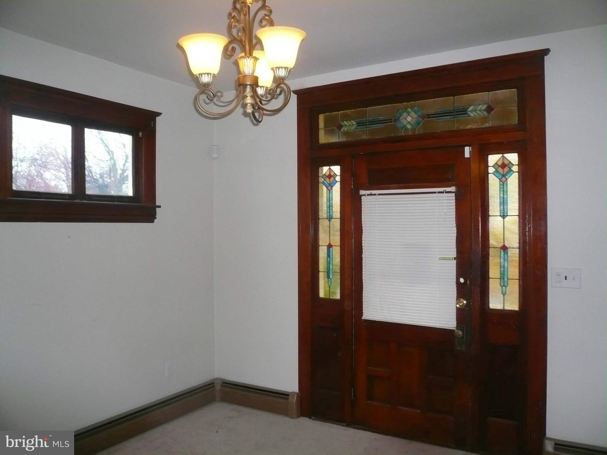 5232 Tramore Road Baltimore, MD 21214 - Photo 3 of 20 a view of empty room with a front door