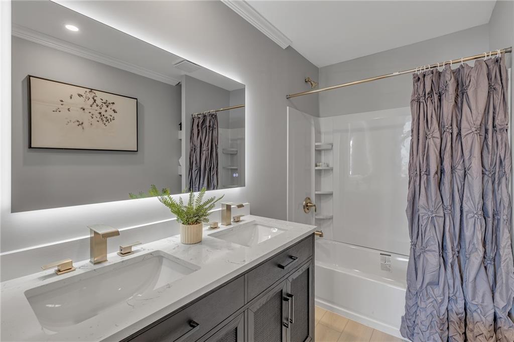 601 Center Avenue Pittsburgh, PA 15202 - Photo 17 of 48 a bathroom with a sink and a mirror