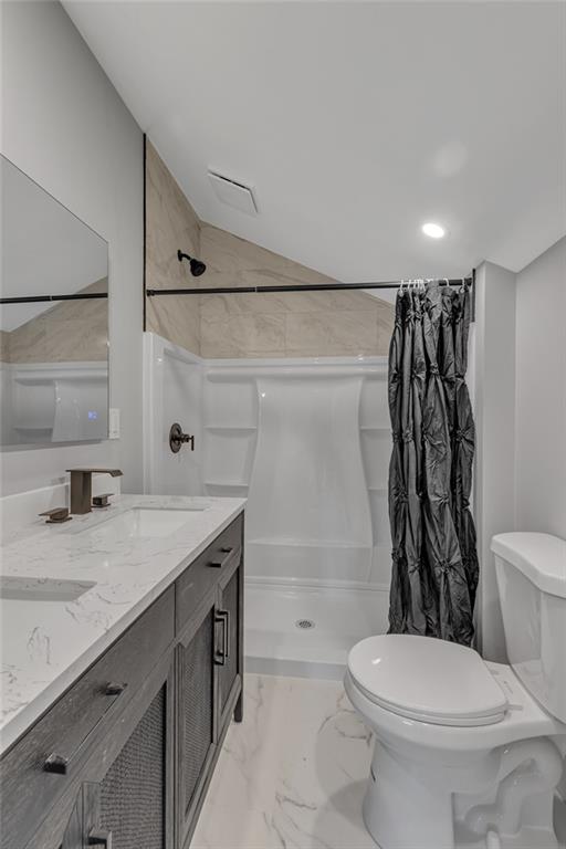 601 Center Avenue Pittsburgh, PA 15202 - Photo 26 of 48 a bathroom with a granite countertop sink toilet and shower