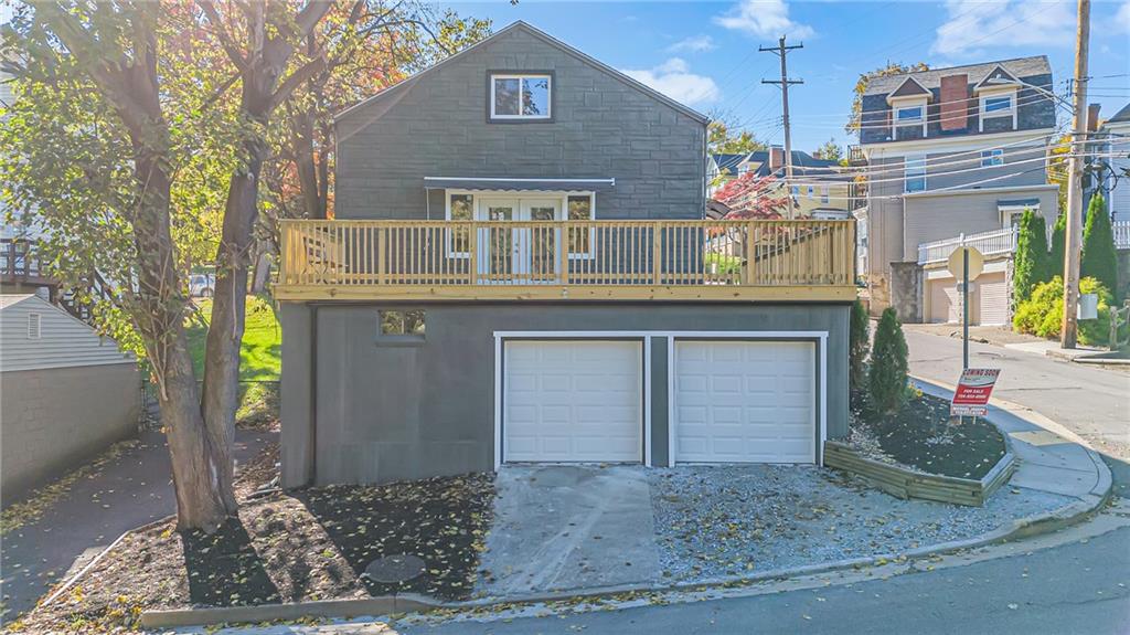 601 Center Avenue Pittsburgh, PA 15202 - Photo 36 of 48 a front view of a house with a yard