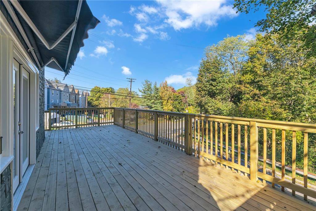 601 Center Avenue Pittsburgh, PA 15202 - Photo 4 of 48 a view of a balcony with wooden floor and outdoor space