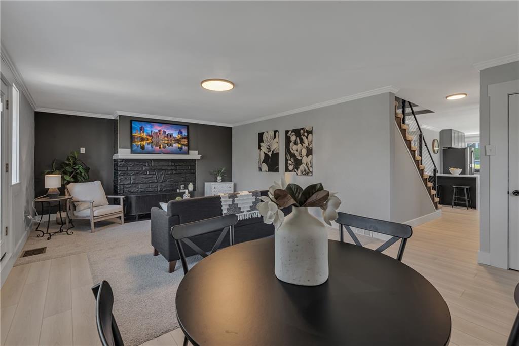 601 Center Avenue Pittsburgh, PA 15202 - Photo 6 of 48 a living room with furniture and a fireplace