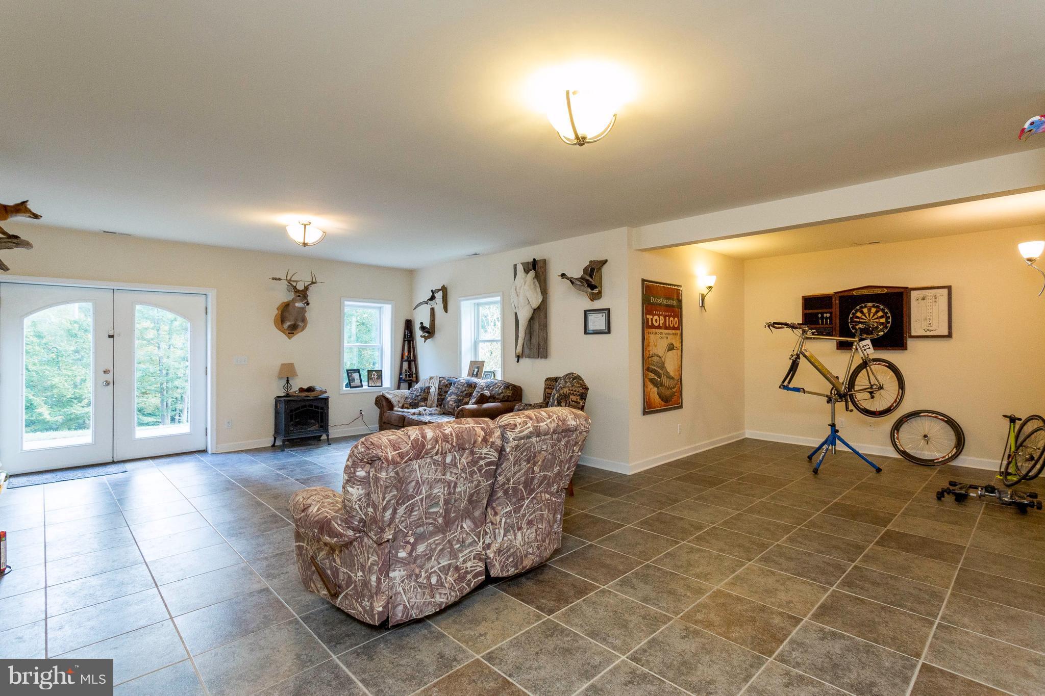 472 McCarty Road Fredericksburg, VA 22405 - Photo 20 of 30 Spacious rec room with walk out exit!