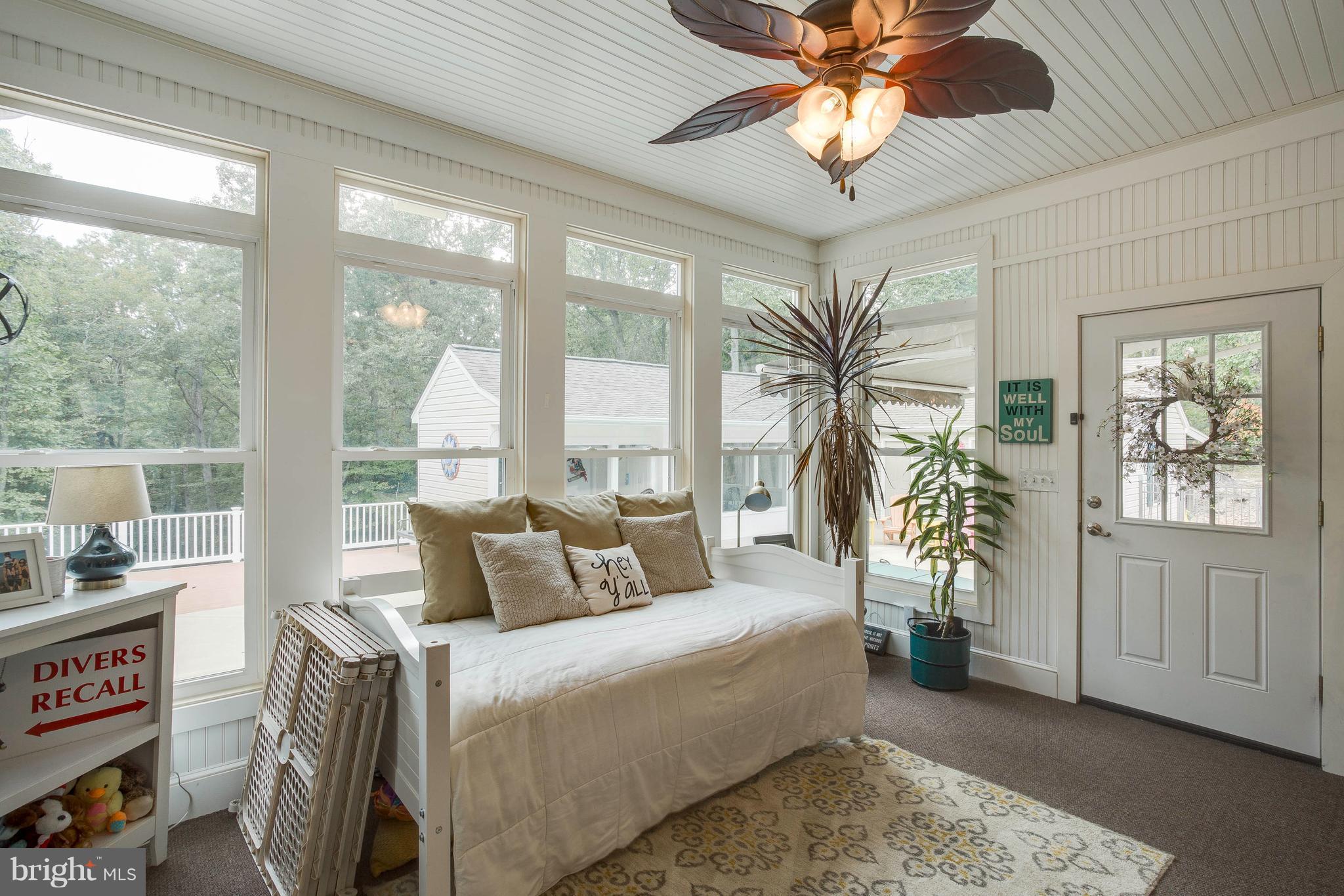 472 McCarty Road Fredericksburg, VA 22405 - Photo 4 of 30 Light, bright sunroom with exit to pool!