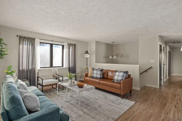 a living room with furniture and a couch