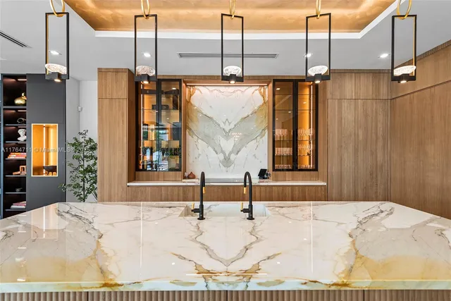 a spacious bedroom with bed and large windows