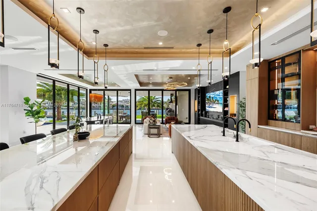 a spacious bedroom with a large bed and a large window