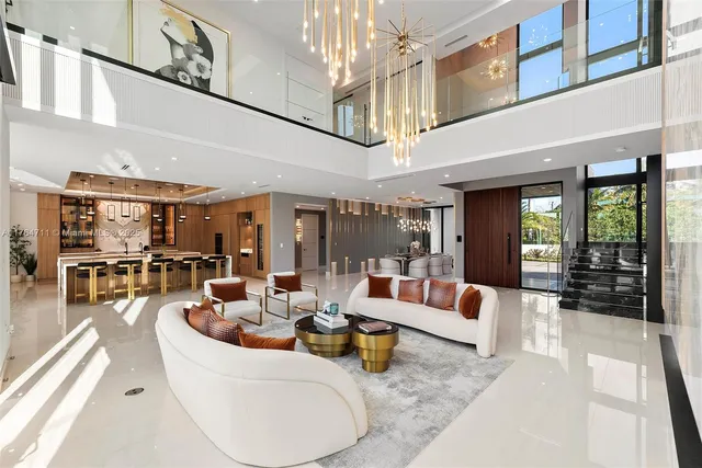 a bedroom with a large bed and a large window