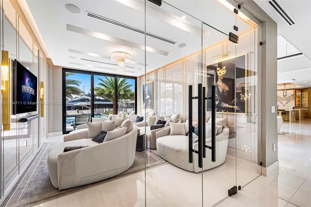 a room with furniture and a large window