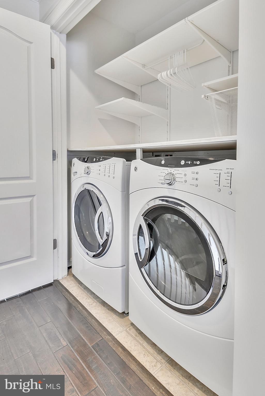 22652 Gray Falcon Square Ashburn, VA 20148 - Photo 20 of 24 a utility room with dryer and washer