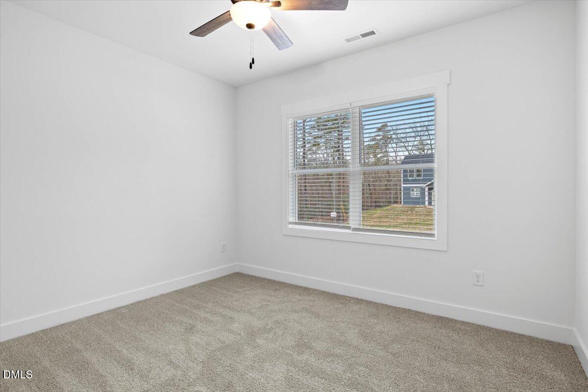 929 Jasmine Road Fuquay-Varina, NC 27526 - Photo 17 of 27 an empty room with a window