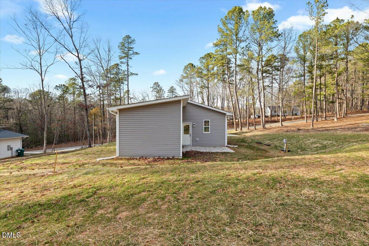 929 Jasmine Road Fuquay-Varina, NC 27526 - Photo 23 of 27 a view of a backyard of the house