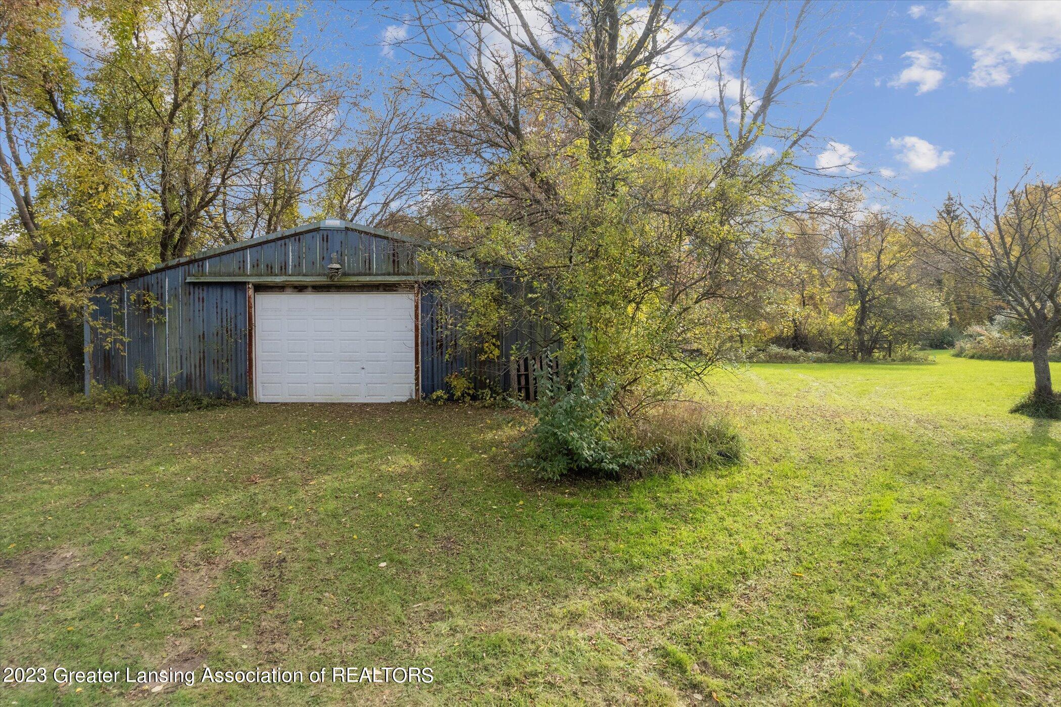 700 Frick Road Leonard, MI 48367 - Photo 56 of 66 65-700-Frick-Rd-Leonard-MI-48367-WindowS