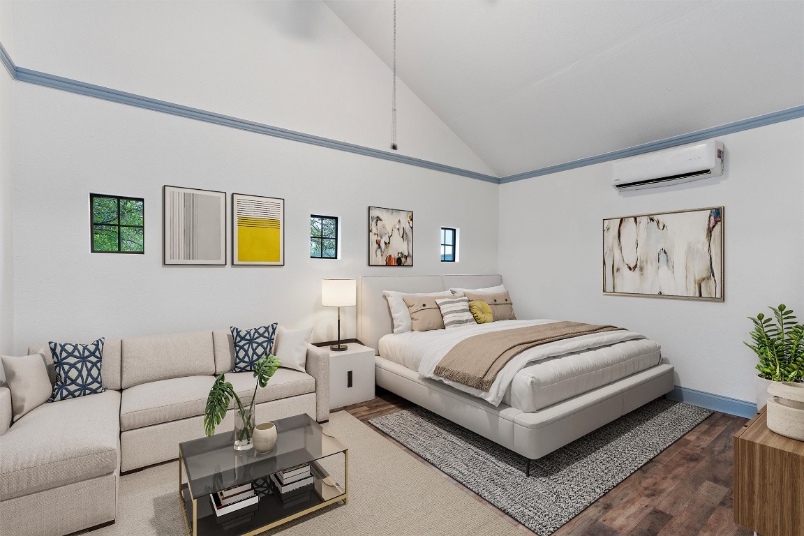 1100 High Road San Marcos, TX 78666 - Photo 14 of 36 a bedroom with a bed a couch and paintings on the wall