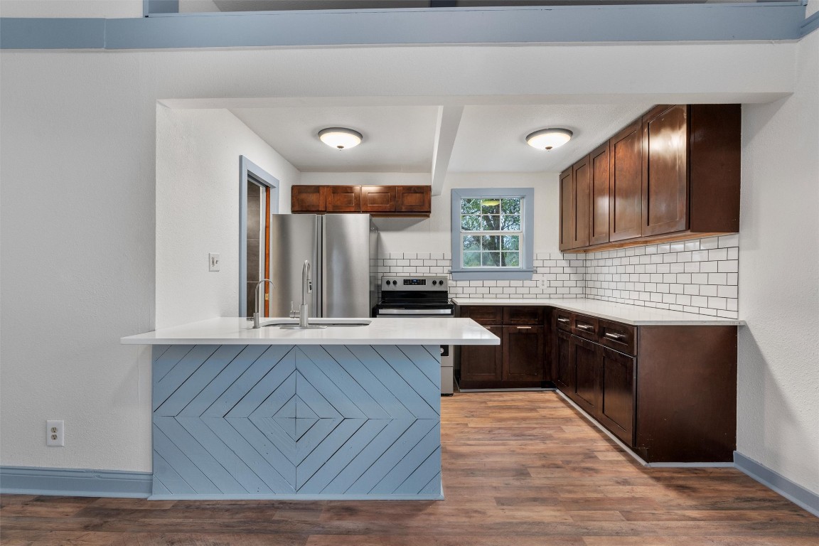 1100 High Road San Marcos, TX 78666 - Photo 16 of 36 a spacious bathroom with a granite countertop sink and a mirror