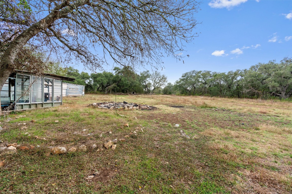 1100 High Road San Marcos, TX 78666 - Photo 30 of 36 a view of a big yard with large trees