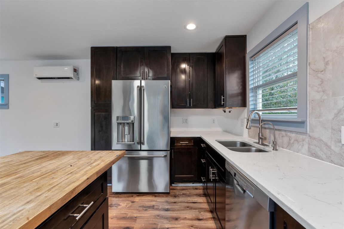 1100 High Road San Marcos, TX 78666 - Photo 5 of 36 a kitchen with kitchen island a sink stove and refrigerator