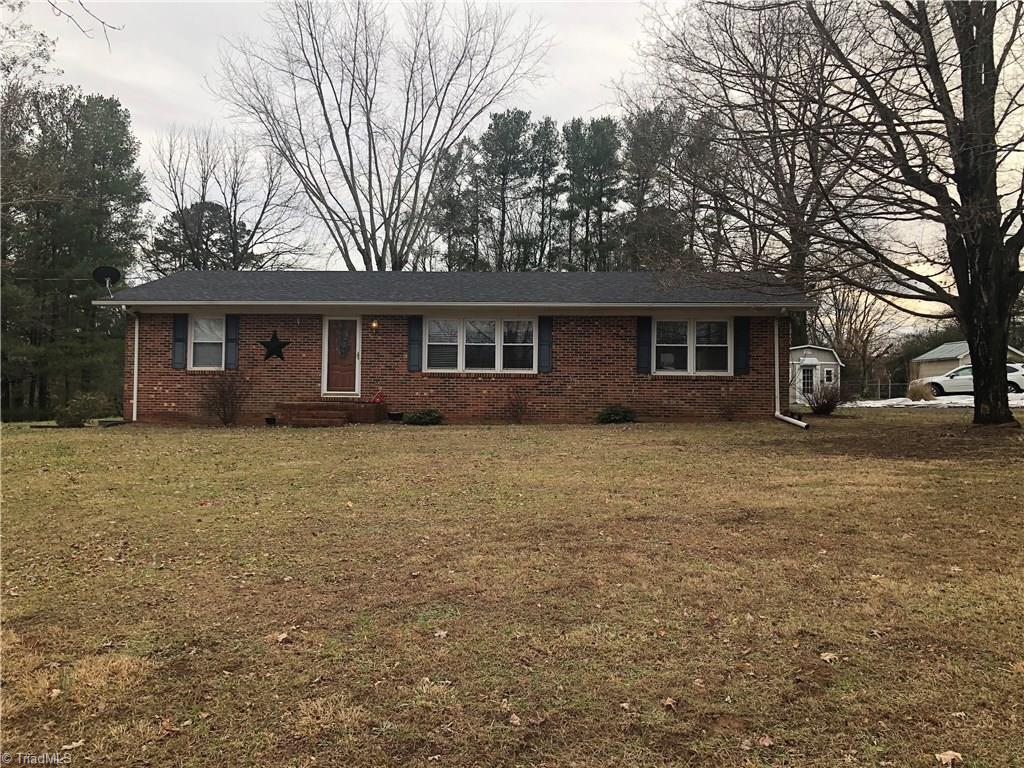156 Mills Road Mount Airy, NC 27030 - Photo 3 of 29 Front of the home, wait until you see the room it has inside.