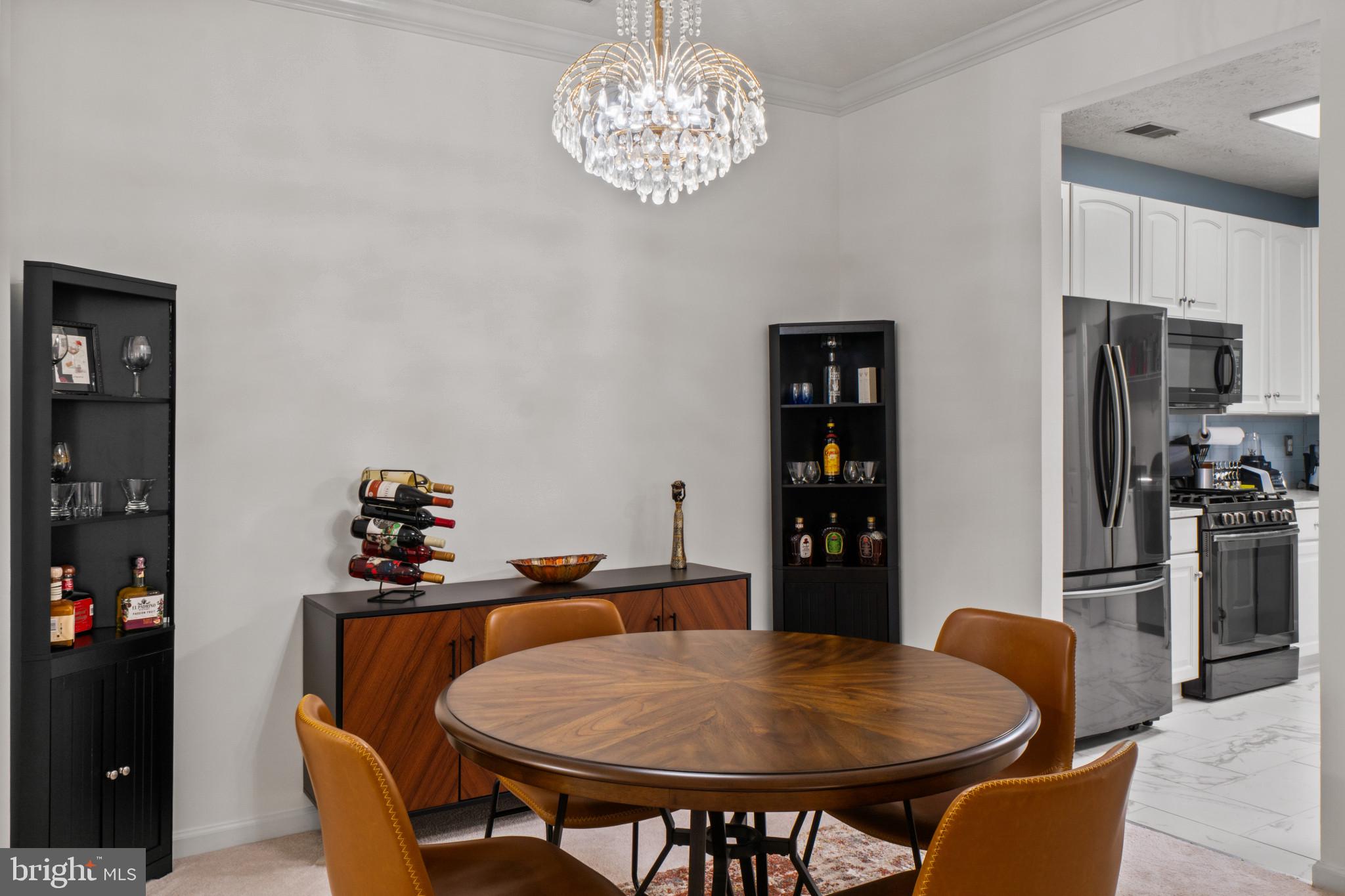 5144 Brightleaf Court, Unit 5144 Rosedale, MD 21237 - Photo 7 of 35 Elegant dining space with modern charm.