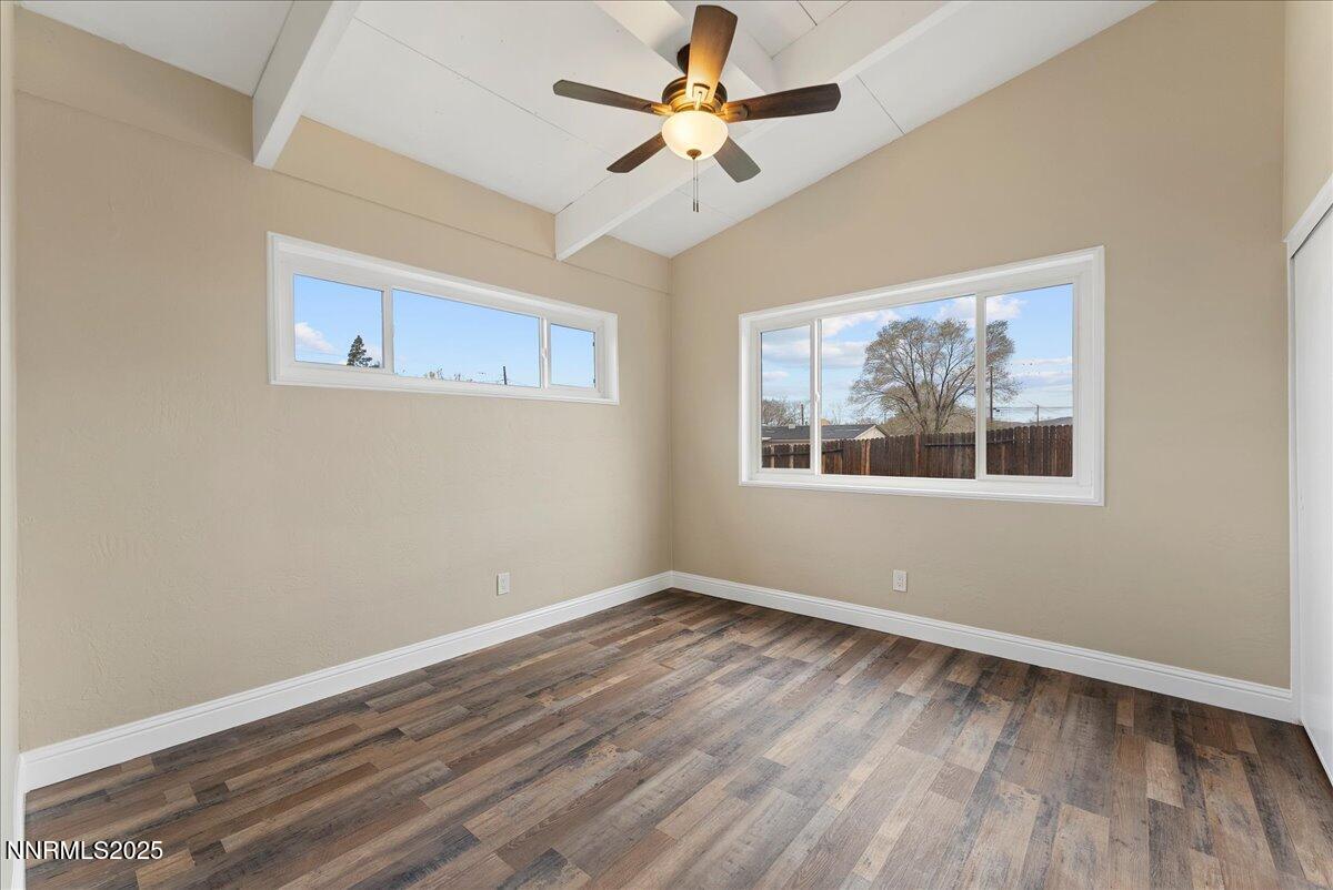 11642 Green Mountain Street Reno, NV 89506 - Photo 11 of 20 a view of empty room with wooden floor and fan