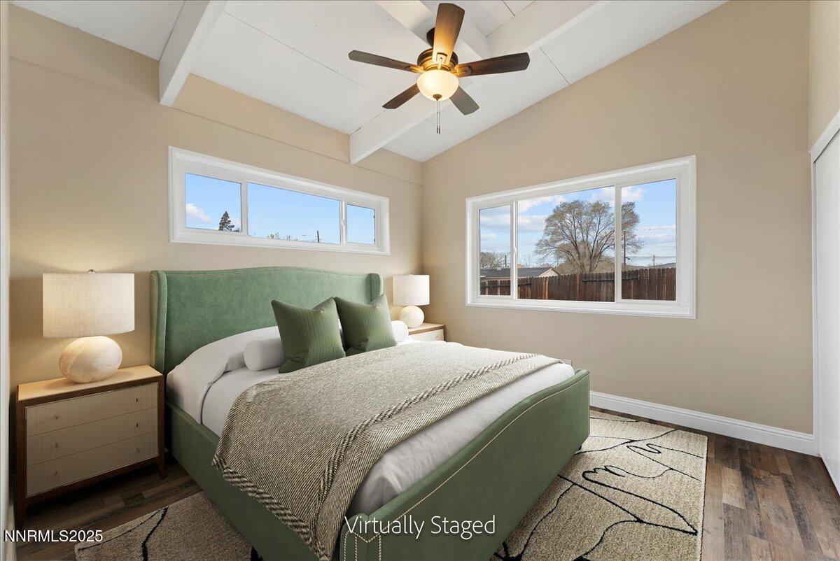 11642 Green Mountain Street Reno, NV 89506 - Photo 12 of 20 a bedroom with a bed and window