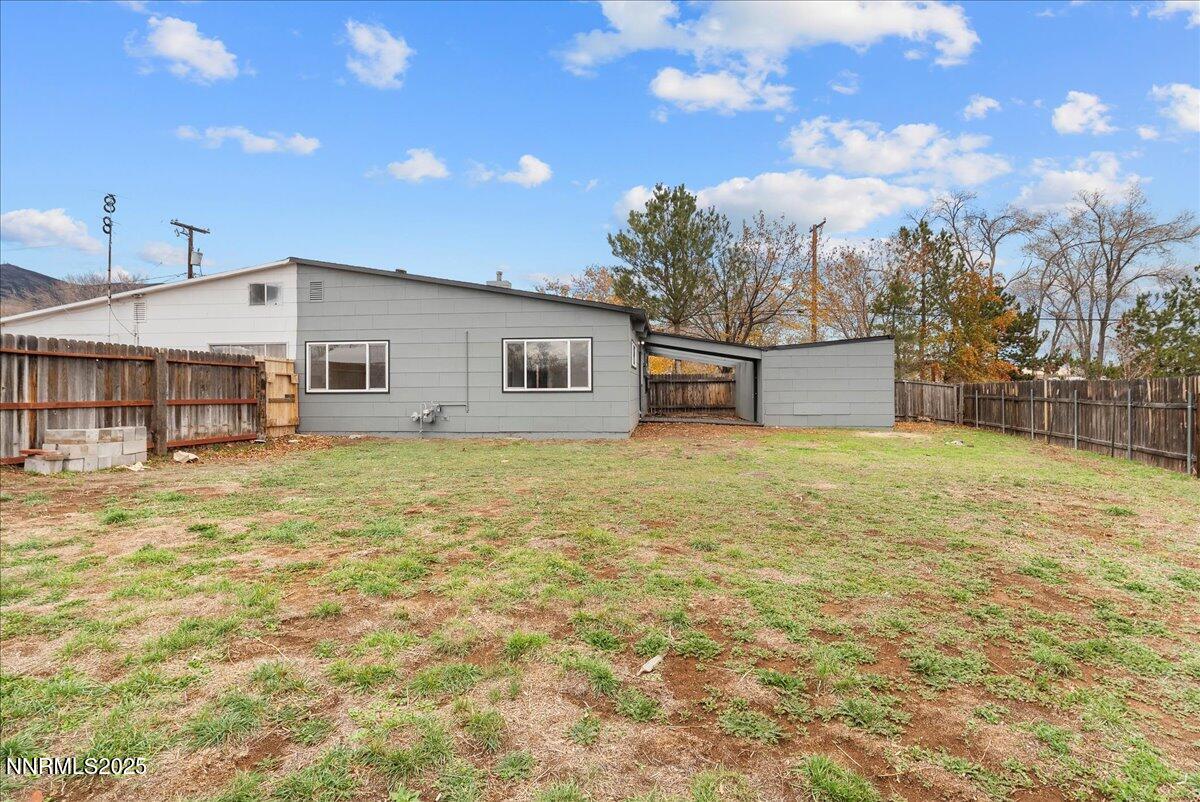 11642 Green Mountain Street Reno, NV 89506 - Photo 17 of 20 a view of a house with a yard