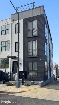 a front view of a building and a street