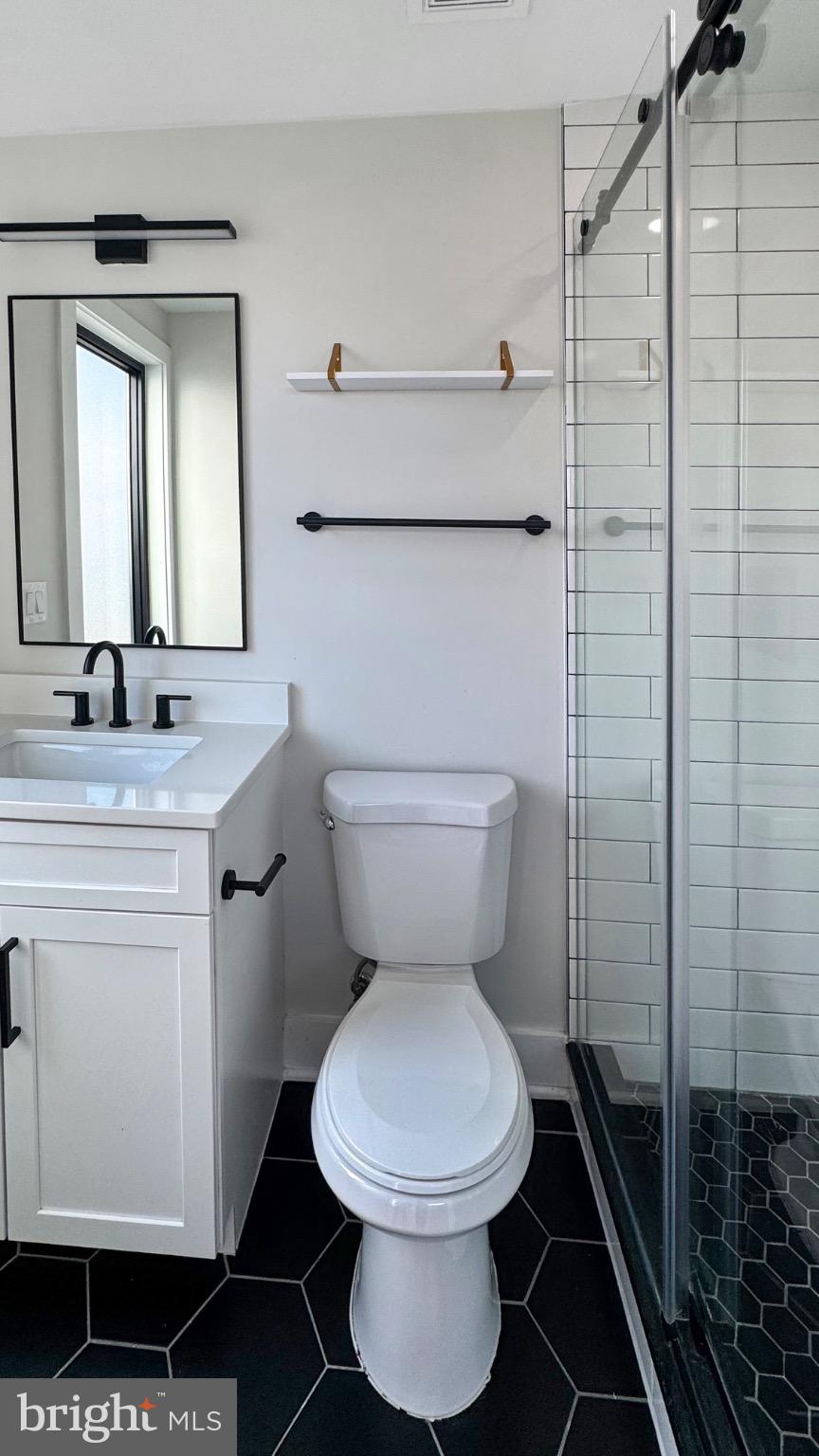 1026 18th Street Northeast, Unit PH6 Washington, DC 20002 - Photo 6 of 11 Sleek modern bathroom with stylish accents.