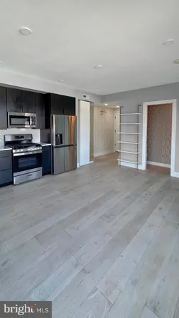 a view of kitchen with furniture and window