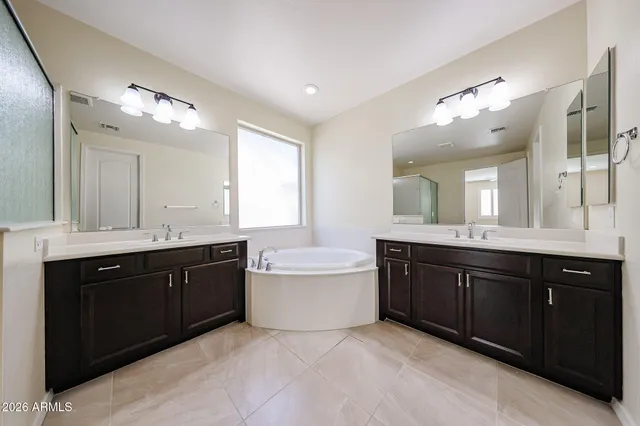 a view of a livingroom with a ceiling fan and window