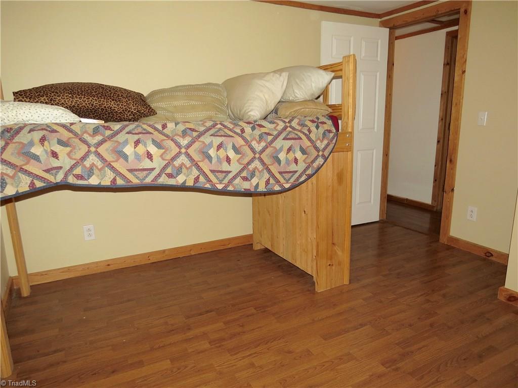 1170 Guerrant Springs Road Ruffin, NC 27326 - Photo 7 of 22 Bedroom 3 with laminate flooring