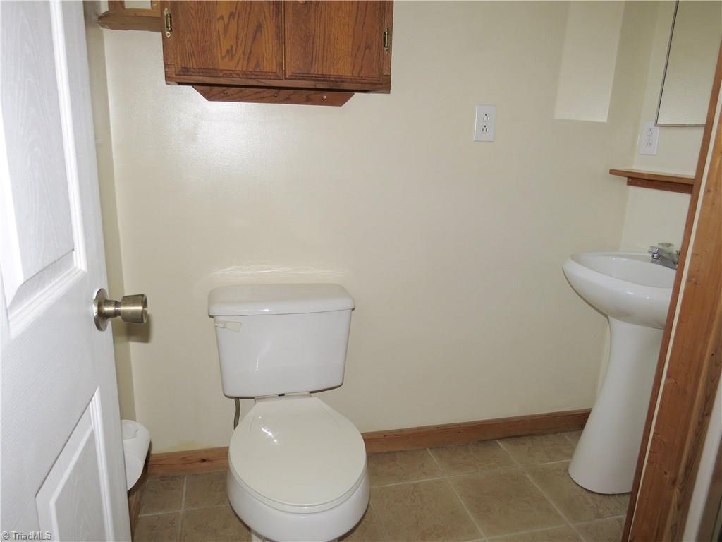 1170 Guerrant Springs Road Ruffin, NC 27326 - Photo 9 of 22 Master bath with pedestal sink
