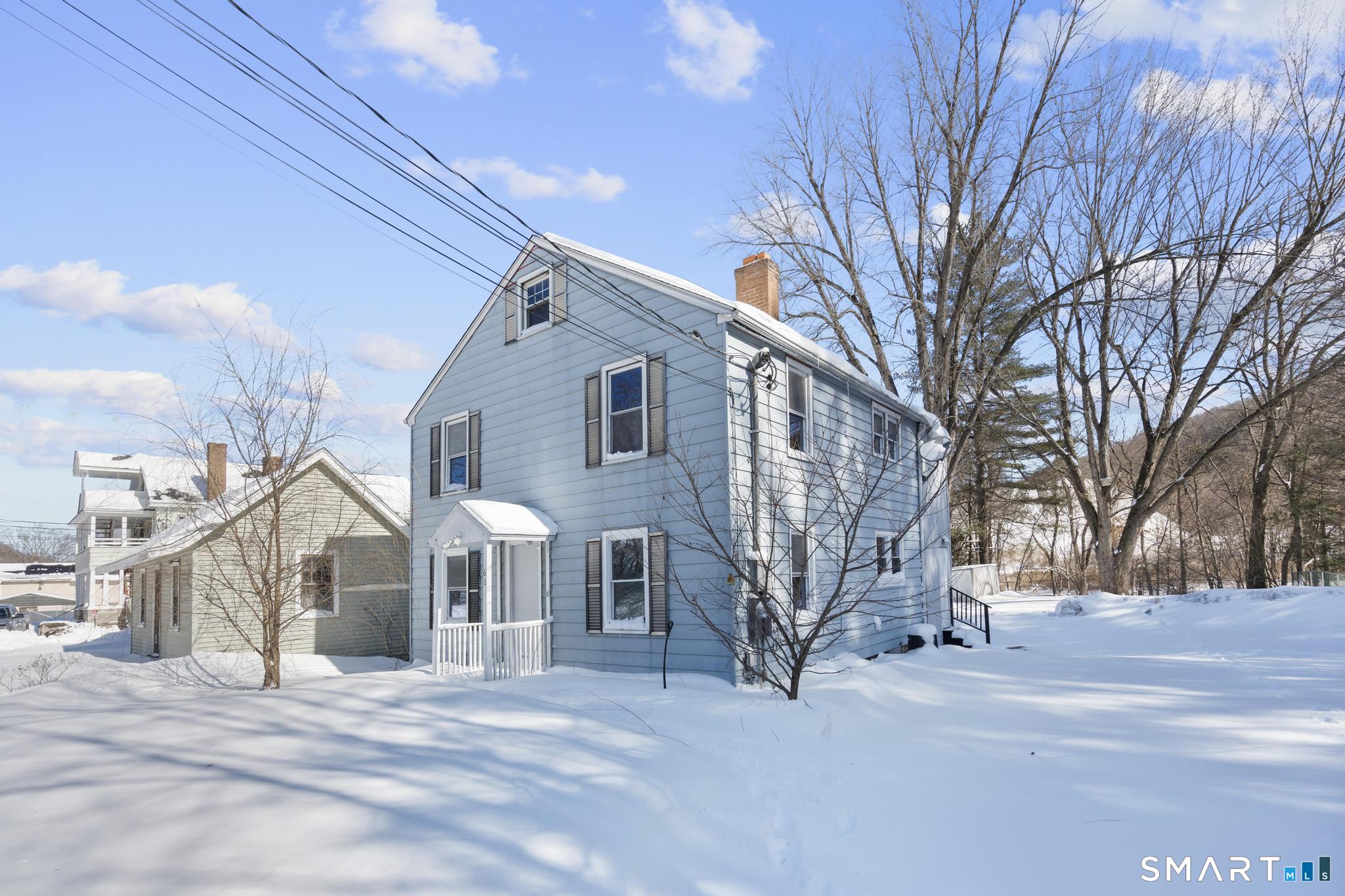 68 Thomaston Road Litchfield, CT 06791 - Photo 16 of 18 a view of a house with a yard