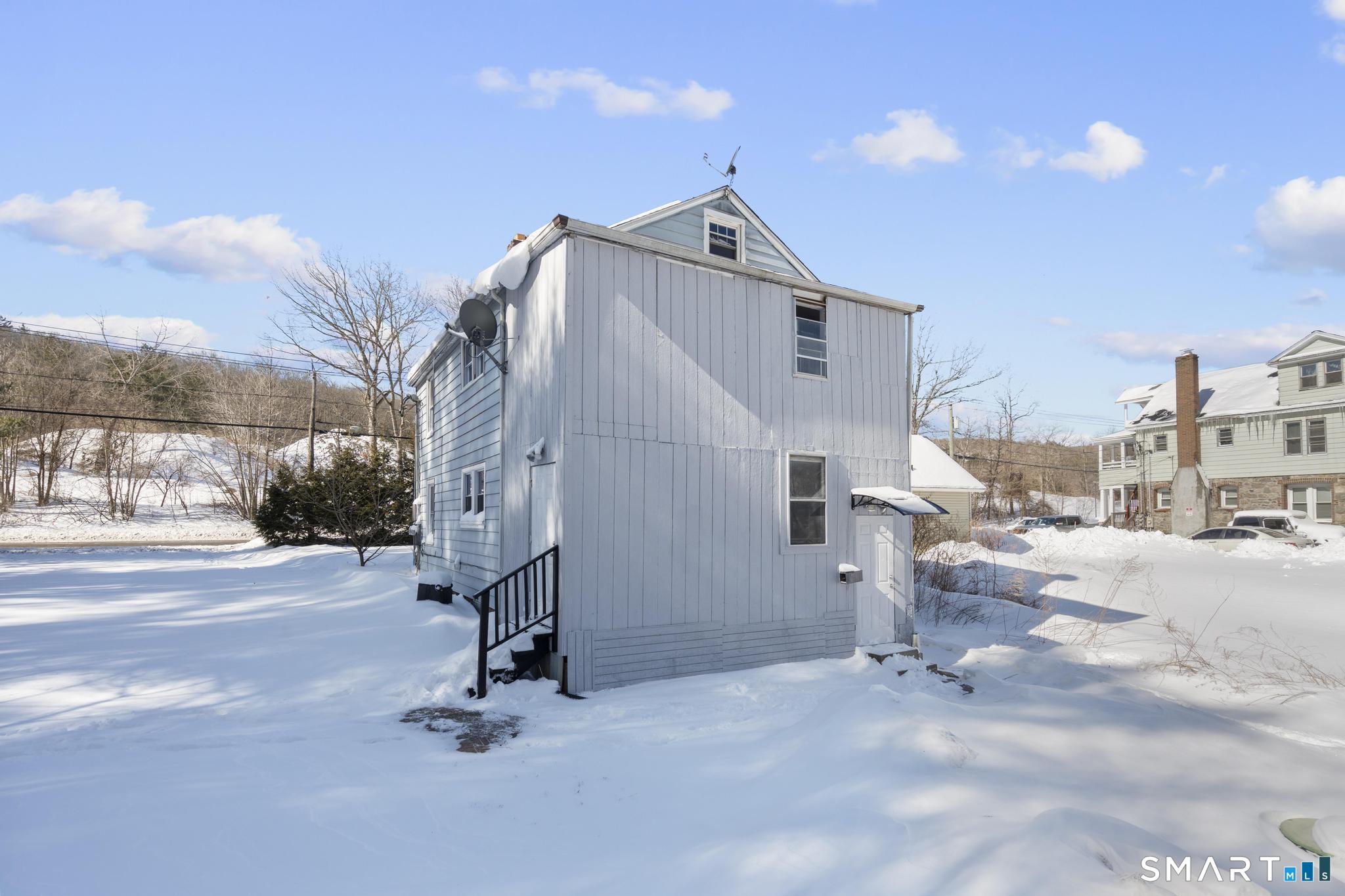 68 Thomaston Road Litchfield, CT 06791 - Photo 17 of 18 a view of a house with a yard