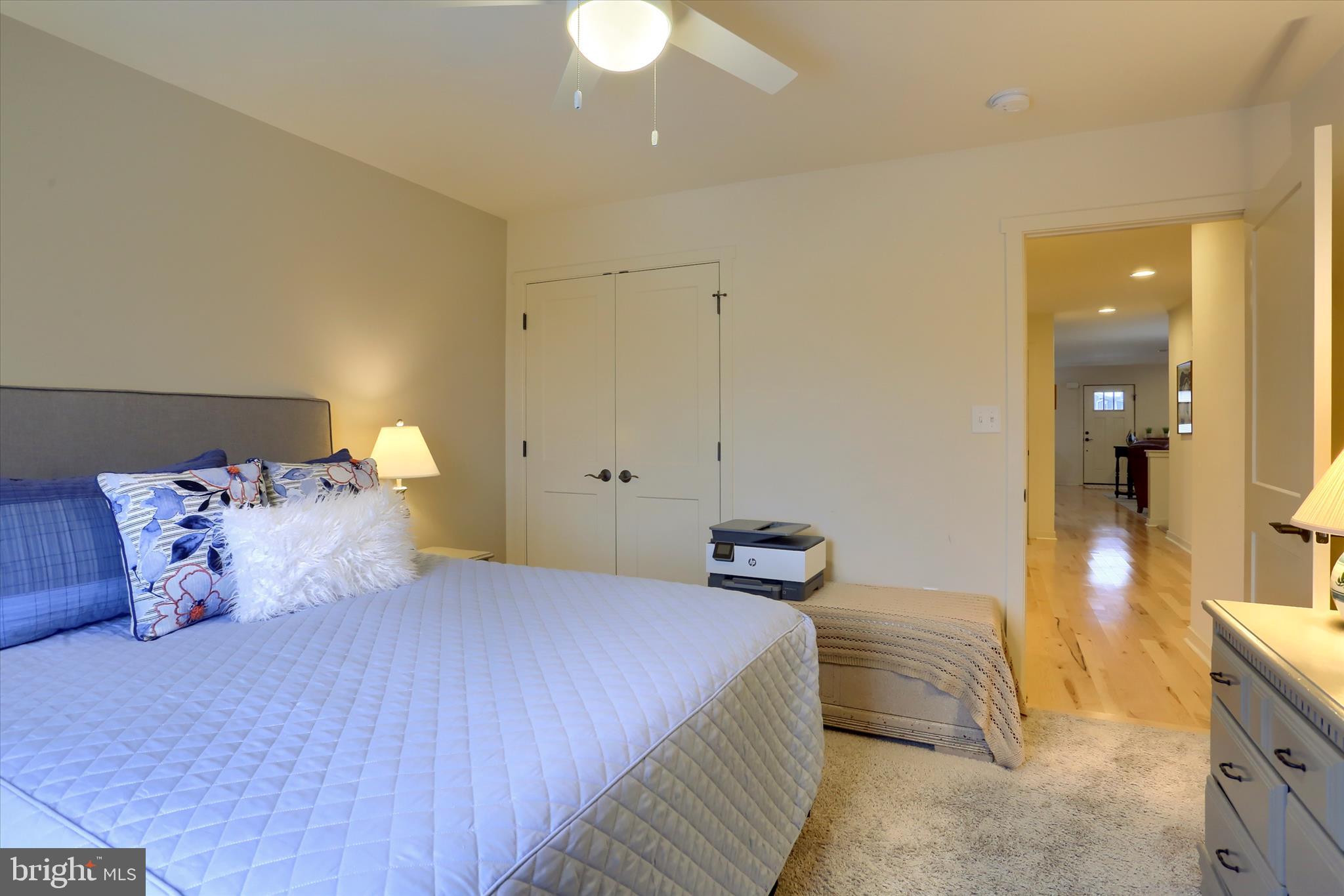 6238 Overview Lane Harrisburg, PA 17111 - Photo 18 of 34 a bedroom with a bed and a chandelier