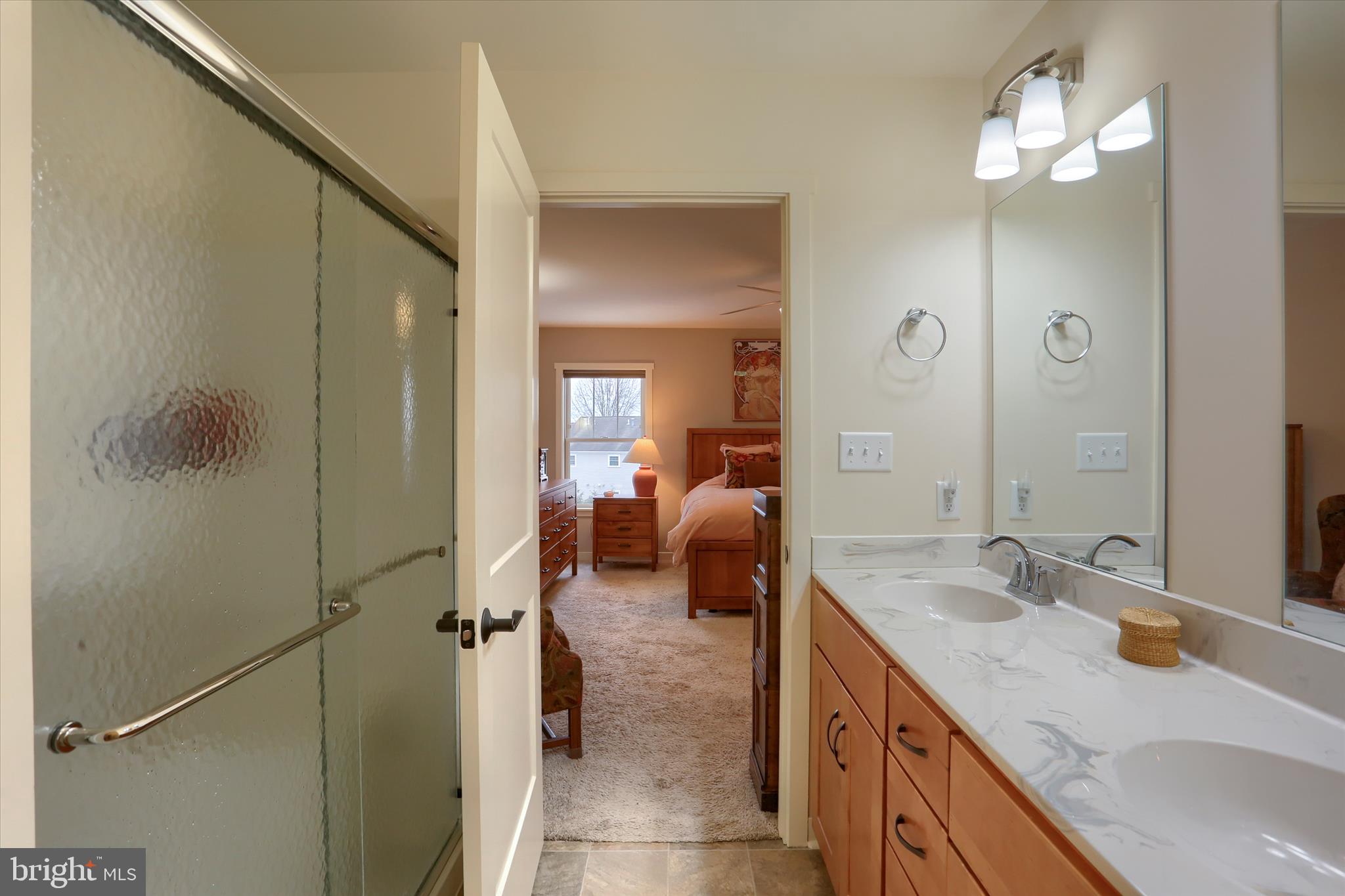6238 Overview Lane Harrisburg, PA 17111 - Photo 22 of 34 a en suite bathroom with a double sink and mirror