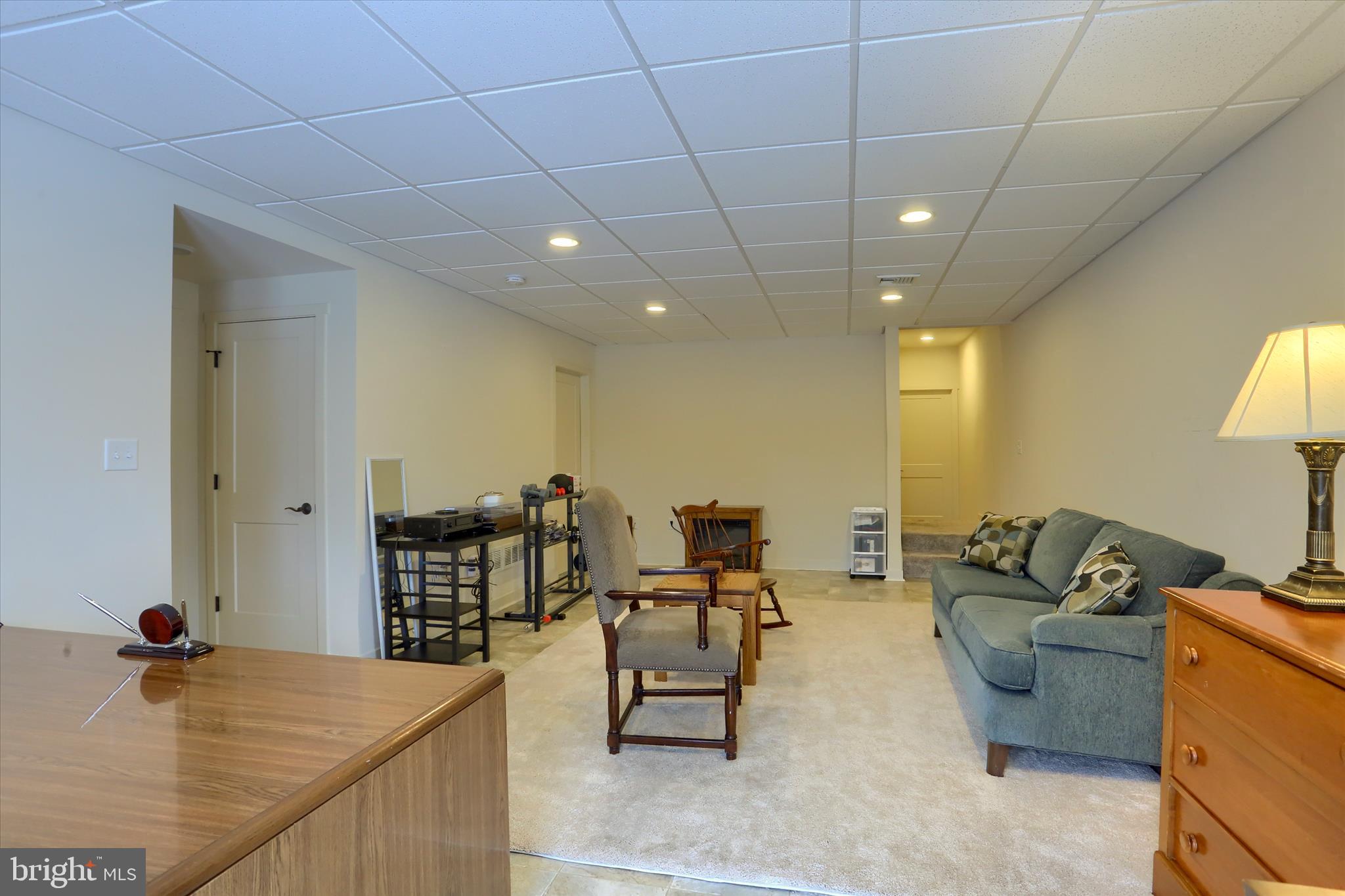 6238 Overview Lane Harrisburg, PA 17111 - Photo 24 of 34 a living room with furniture and a table